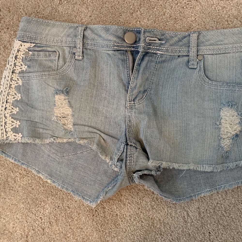 Denim shorts with crochet detailing